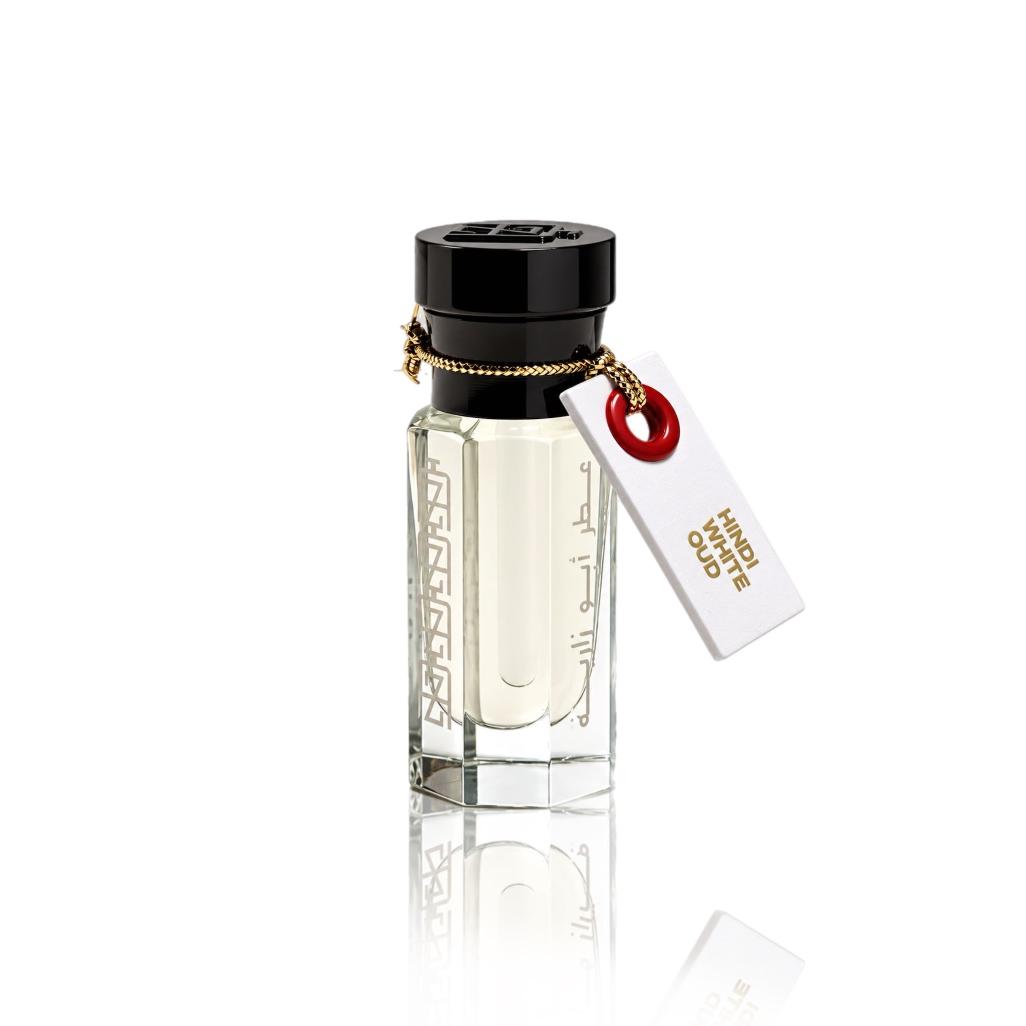 Hindi White Oud attar perfume oil bottle with black cap, white name tag, and gold cord.