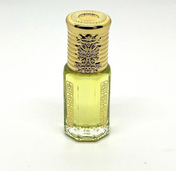 White Oud Arabian perfume oil inside Abu Zari USA brand attar bottles with Abu Zari USA logo and gold royal cap.